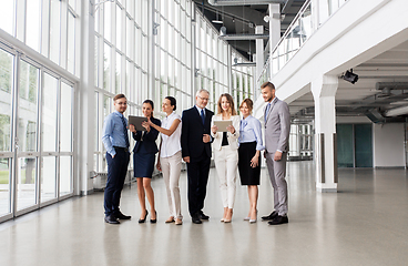 Image showing business people with tablet pc computer at office