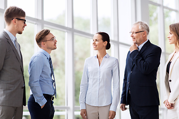 Image showing business people talking at office building