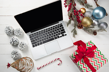 Image showing Mock up blank empty screen of laptop on white background