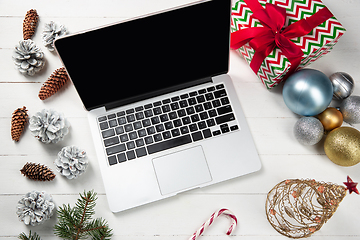 Image showing Mock up blank empty screen of laptop on white background