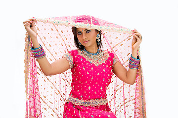 Image showing Beautiful Bangali bride lifting veil