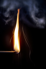 Image showing match flame dark background