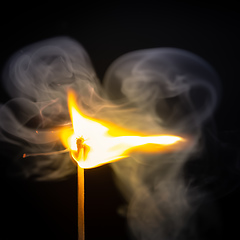 Image showing match flame dark background