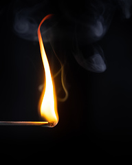 Image showing match flame dark background