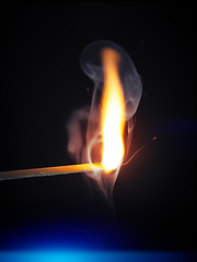 Image showing match flame dark background