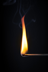 Image showing match flame dark background