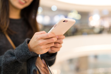 Image showing Woman working on mobile phone