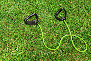 Image showing Fit tube on the green grass background