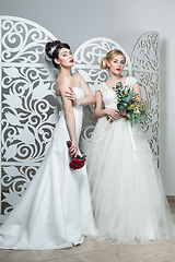 Image showing beautiful girls in wedding gown