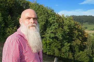 Image showing white bearded man in the forest