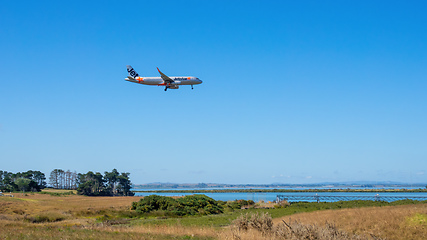 Image showing Jetstar airplane is landing at the Auckland Airport