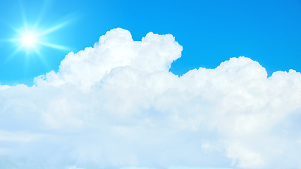 Image showing typical blue sky with sun and clouds background