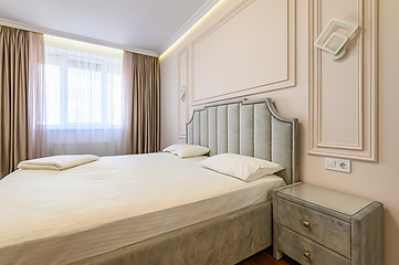 Image showing Pink and grey modern bedroom interior with double bed