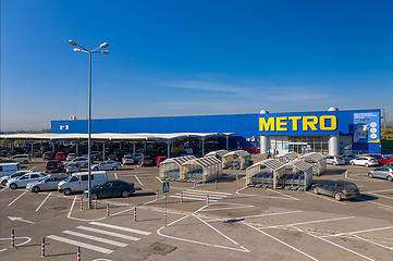 Image showing Metro retail store, large shopping mall of household and food goods with parking, aerial view, copyspace