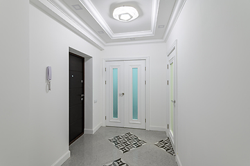 Image showing interior of white hallway with doors