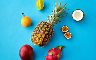 Image showing pineapple with other fruits on blue background