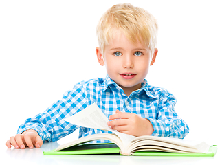 Image showing Little child play with book