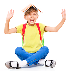 Image showing Portrait of a cute little schoolgirl with backpack