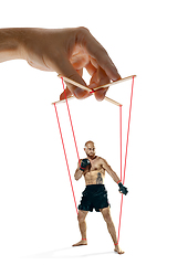 Image showing Man like a puppet in somebodies hands. Concept of manipulation