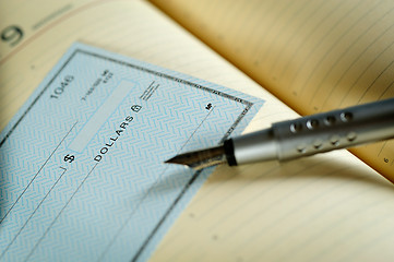 Image showing money check and pen