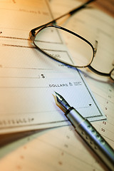 Image showing Money check and glasses