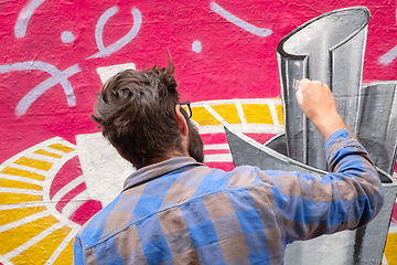 Image showing street art artist at work