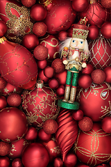 Image showing Christmas Nutcracker Soldier and Red Bauble Decorations