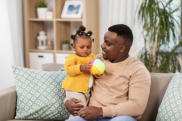 Image showing happy african american father with baby at home