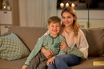 Image showing happy smiling mother with her son at home