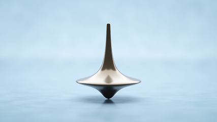 Image showing Spinning top on a table