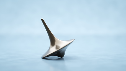 Image showing Spinning top on a table