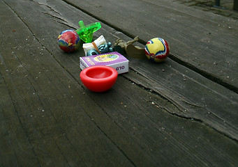 Image showing Toys on Bench