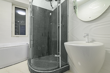 Image showing Modern luxury white and chrome bathroom