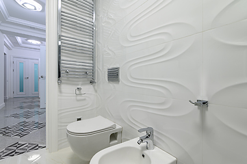 Image showing Modern luxury white and chrome bathroom