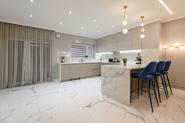 Image showing Luxury white modern marble kitchen in studio space