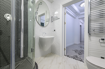 Image showing Modern luxury white and chrome bathroom