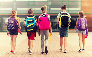 Image showing group of happy elementary school students walking