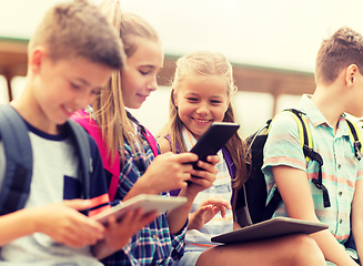 Image showing group of happy elementary school students talking