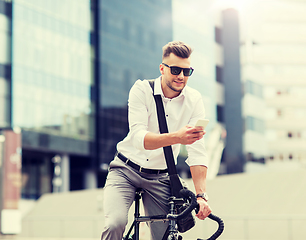 Image showing man with bicycle and smartphone on city street