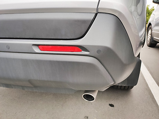 Image showing Back of a car with an exhaust pipe