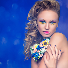 Image showing beautiful girl with flower accessories