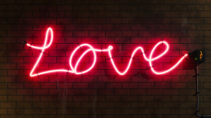 Image showing Love sign neon letters at a brick wall