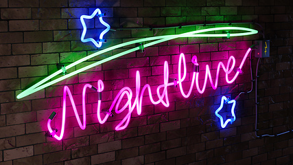 Image showing neon light sign nightlive with stars