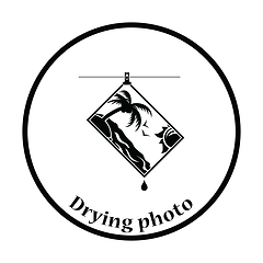 Image showing Icon of photograph drying on rope