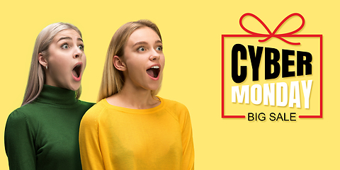 Image showing Portrait of young caucasian women surprised and shocked of cyber monday