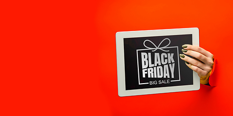 Image showing Hands holding tablet screen with black friday lettering