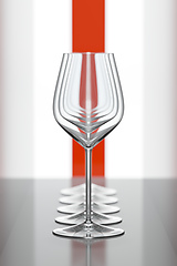 Image showing wineglasses in a row with a red stripe