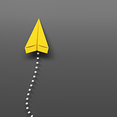 Image showing yellow paper plane on a gray background