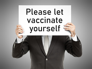 Image showing business man message Please let vaccinate yourself