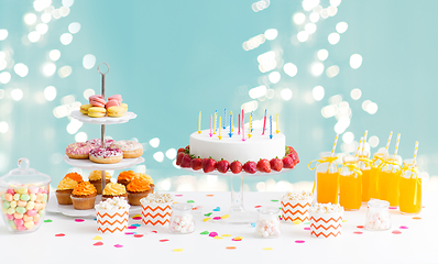 Image showing food and drinks on table at birthday party